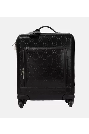 Gucci GG Small embossed carry-on suitcase