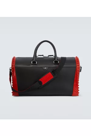 Christian Louboutin Kobieta Torebki - Sneakender spiked leather duffel bag
