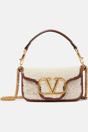 VALENTINO GARAVANI LocÃ² Small shearling and leather shoulder bag