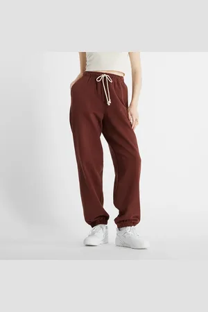 New Balance Spodnie damskie WP41513ROK – brązowe