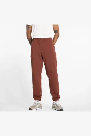 New Balance Spodnie męskie MP41508ROK – brązowe
