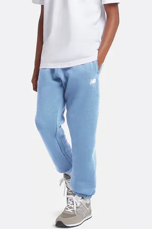 New Balance Spodnie dziecięce LAKB0007HEB – niebieskie