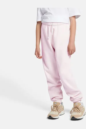 New Balance Spodnie dziecięce LAKG0005LIR – różowe