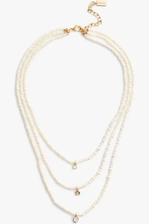 Coach Tone Pearl Multilayer Charm NecklaceJeden