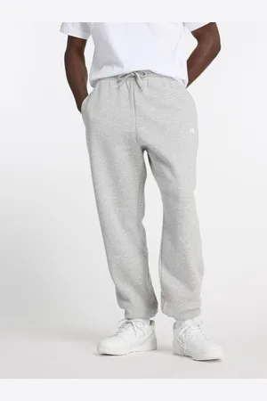 New Balance Polarowe joggersy męskie EssentialsXXL