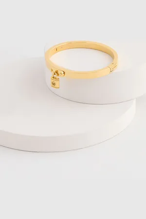 Kate Spade Gold Tone Charm BangleJeden