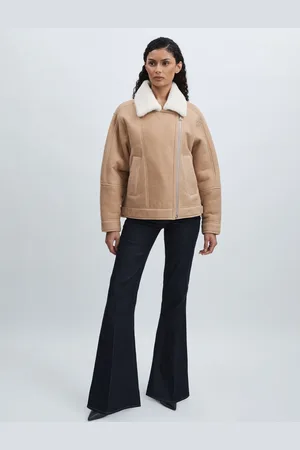 Paige Angled-Waist Flared Jeans25