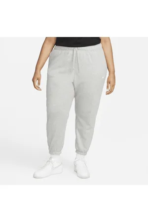 Nike Kobieta Bluzy sportowe - Damskie spodnie dresowe o kroju oversize ze średnim stanem Sportswear Club Fleece (duże rozmiary)