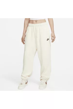 Nike Kobieta Bluzy sportowe - Damskie spodnie dresowe o kroju oversize ze średnim stanem Sportswear Club Fleece