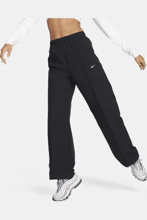 Nike Damskie spodnie ze średnim stanem i luźnymi nogawkami Sportswear Everything Wovens