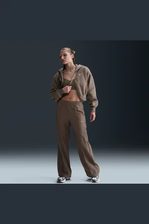 Nike Damskie spodnie ze średnim stanem i luźnymi nogawkami Sportswear Everything Wovens