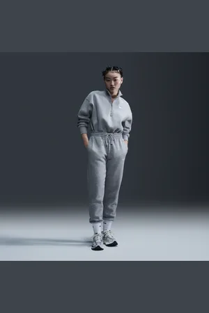 Nike Damskie spodnie dresowe ze średnim stanem Sportswear Phoenix Fleece