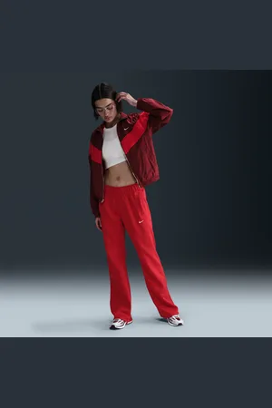 Nike Damskie dopasowane spodnie z dzianiny ze średnim stanem Sportswear Windrunner