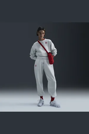 Nike Damskie spodnie piłkarskie o kroju oversize z wysokim stanem Liverpool F.C. Phoenix Fleece (wersja trzecia)