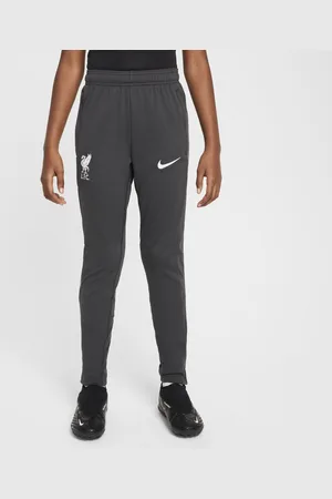 Nike Dzianinowe spodnie piłkarskie dla dużych dzieci Dri-FIT Liverpool F.C. Academy Pro