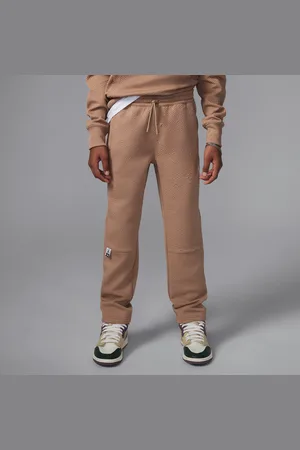 Jordan Spodnie z dzianiny dla dużych dzieci Sneaker School