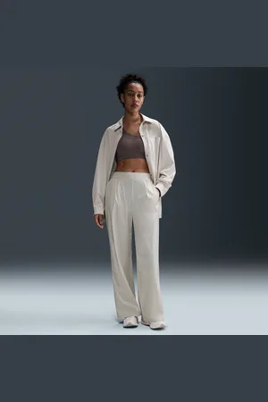 Nike Damskie spodnie z wysokim stanem i luźnymi szerokimi nogawkami Dri-FIT 24.7 PerfectStretch