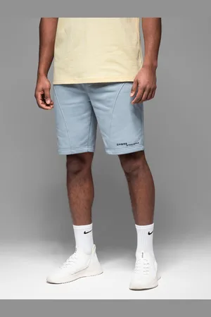 Ombre Clothing Dopasowane ęskie krótkie spodenki dresowe z nadrukami – jasnoniebieskie V1 OM-SRSK-0138
