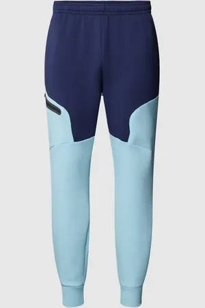 Under Armour Spodnie dresowe z nadrukiem z logo