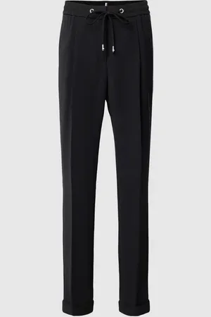 HUGO BOSS Spodnie materiałowe o kroju slim fit w kant model ‘Tariyanah’