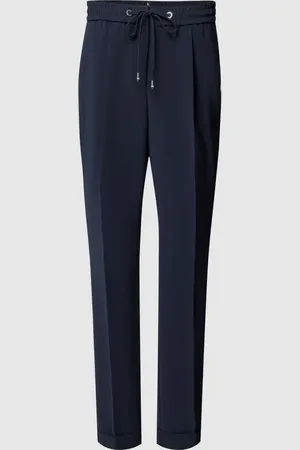 HUGO BOSS Spodnie materiałowe o kroju slim fit w kant model ‘Tariyanah’