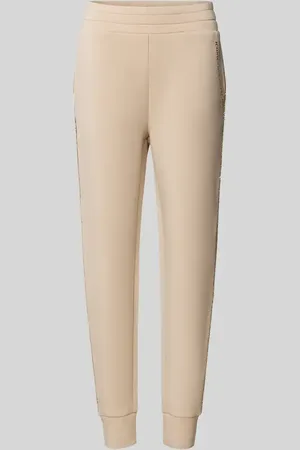 Guess Spodnie dresowe o kroju regular fit z lampasami model ‘SIMONNE’