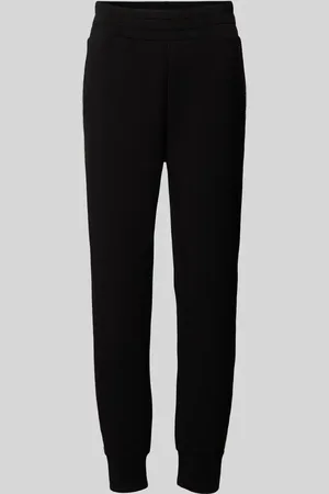 Guess Spodnie dresowe o kroju regular fit z lampasami model ‘SIMONNE’