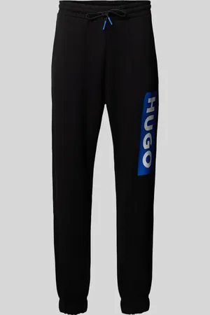 Hugo Blue Spodnie dresowe o kroju regular fit z nadrukiem z logo model ‘Nuram’