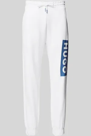 Hugo Blue Spodnie dresowe o kroju regular fit z nadrukiem z logo model ‘Nuram’