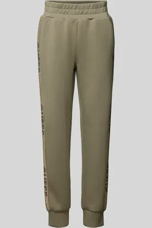 Guess Spodnie dresowe o kroju slim fit z nadrukami z logo