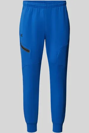 Under Armour Spodnie dresowe o kroju regular fit z kieszenią zapinaną na zamek błyskawiczny model ‘UNSTOPPABLE’