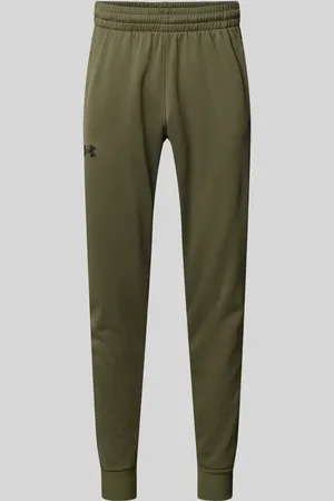 Under Armour Spodnie dresowe o kroju loose fit z bocznymi, wpuszczanymi kieszeniami