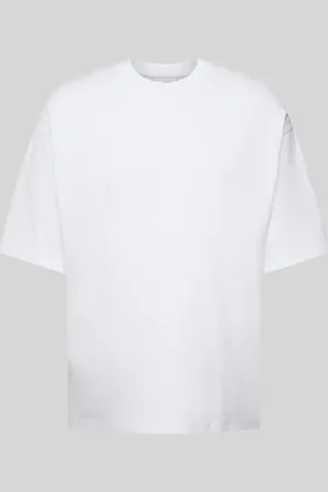 Review T-shirt o kroju oversized z nadrukiem z logo