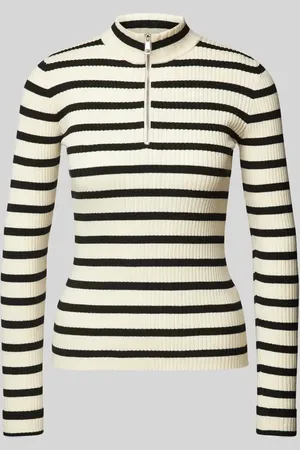 EDITED the label Sweter z dzianiny z golfem model ‘Alison’