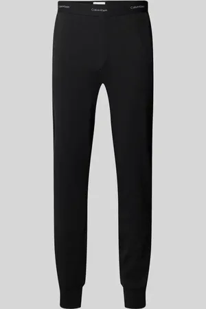 Calvin Klein Spodnie dresowe o kroju regular fit z elastycznymi zakończeniami nogawek