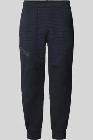 Under Armour Spodnie dresowe o kroju relaxed fit z kieszenią zapinaną na zamek błyskawiczny