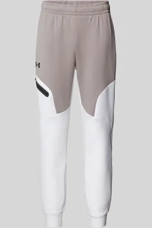 Under Armour Spodnie dresowe z nadrukiem z logo