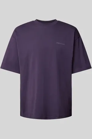 Review T-shirt o kroju oversized z nadrukiem z logo