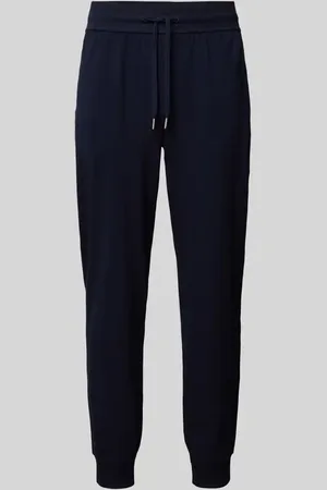 Tommy Hilfiger Spodnie typu track pants o kroju tapered fit z tunelem