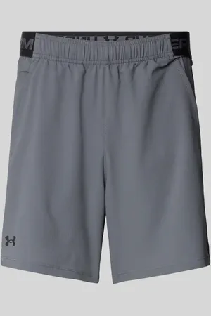 Under Armour Szorty o kroju regular fit z nadrukiem z logo