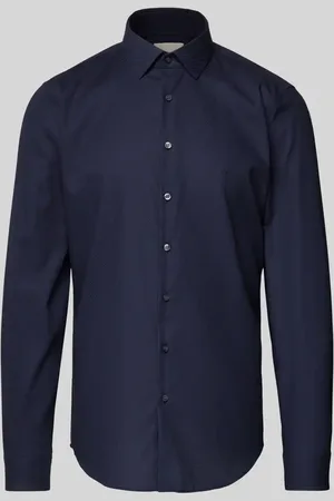 Calvin Klein Koszula biznesowa o kroju slim fit z listwą guzikową model ‘Bari’