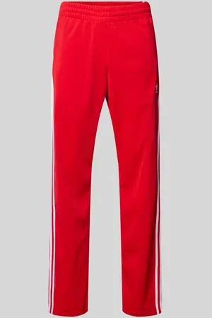 adidas Spodnie dresowe o kroju regular fit z wyhaftowanym logo model ‘FIREBIRD’