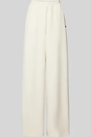 Guess Spodnie dresowe o kroju baggy fit z detalem z logo model ‘OLYMPE’