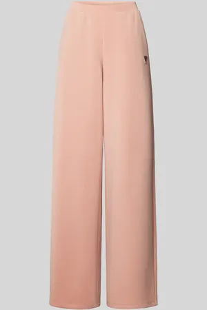 Guess Spodnie dresowe o kroju baggy fit z detalem z logo model ‘OLYMPE’