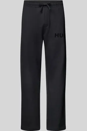 HUGO BOSS Spodnie dresowe z prostą nogawką i nadrukiem z logo model ‘Dumrulo’