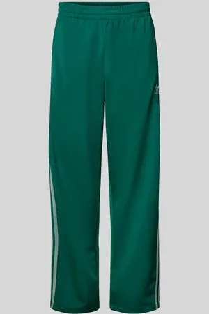 adidas Spodnie dresowe o kroju regular fit z wyhaftowanym logo model ‘FIREBIRD’