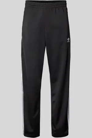adidas Spodnie dresowe o kroju regular fit z wyhaftowanym logo model ‘FIREBIRD’