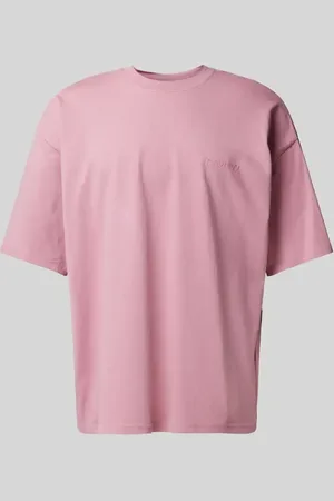 Review T-shirt o kroju oversized z nadrukiem z logo