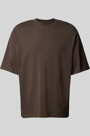 Review T-shirt o kroju oversized z nadrukiem z logo