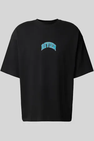 Review T-shirt o kroju oversized z nadrukiem z logo